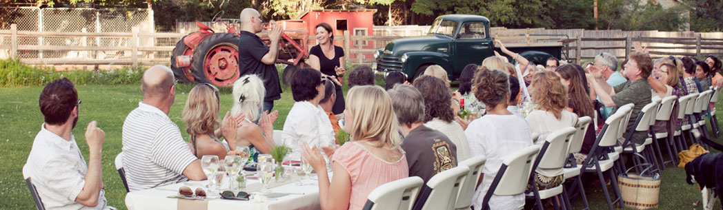 guests seated at a farm to table dinner spread